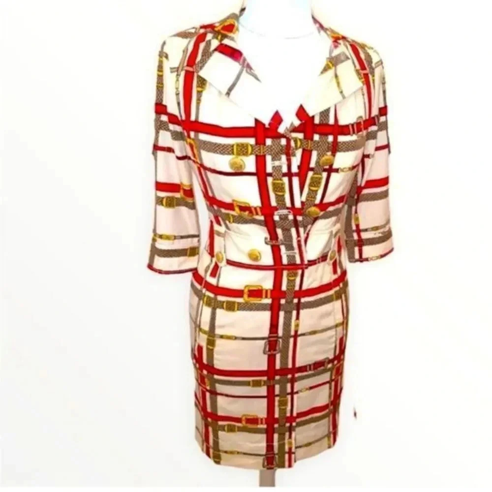 VINTAGE WOMANS DRESS "BELTS
BUCKLES AND BITS" PATTERN VERY
FLATTERING AND CLASSY
